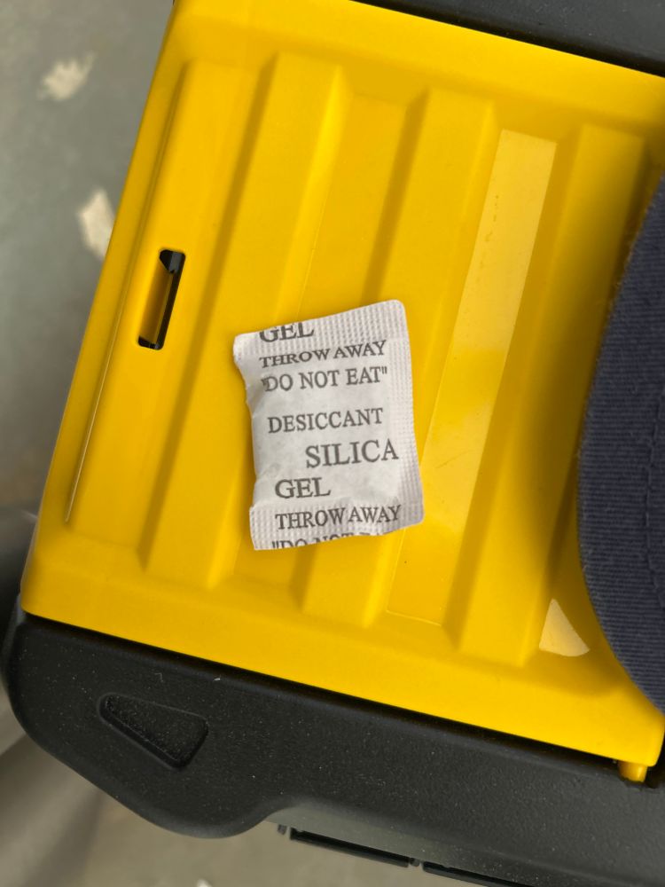 Small pack of silica desiccant. It says clearly “do not eat”