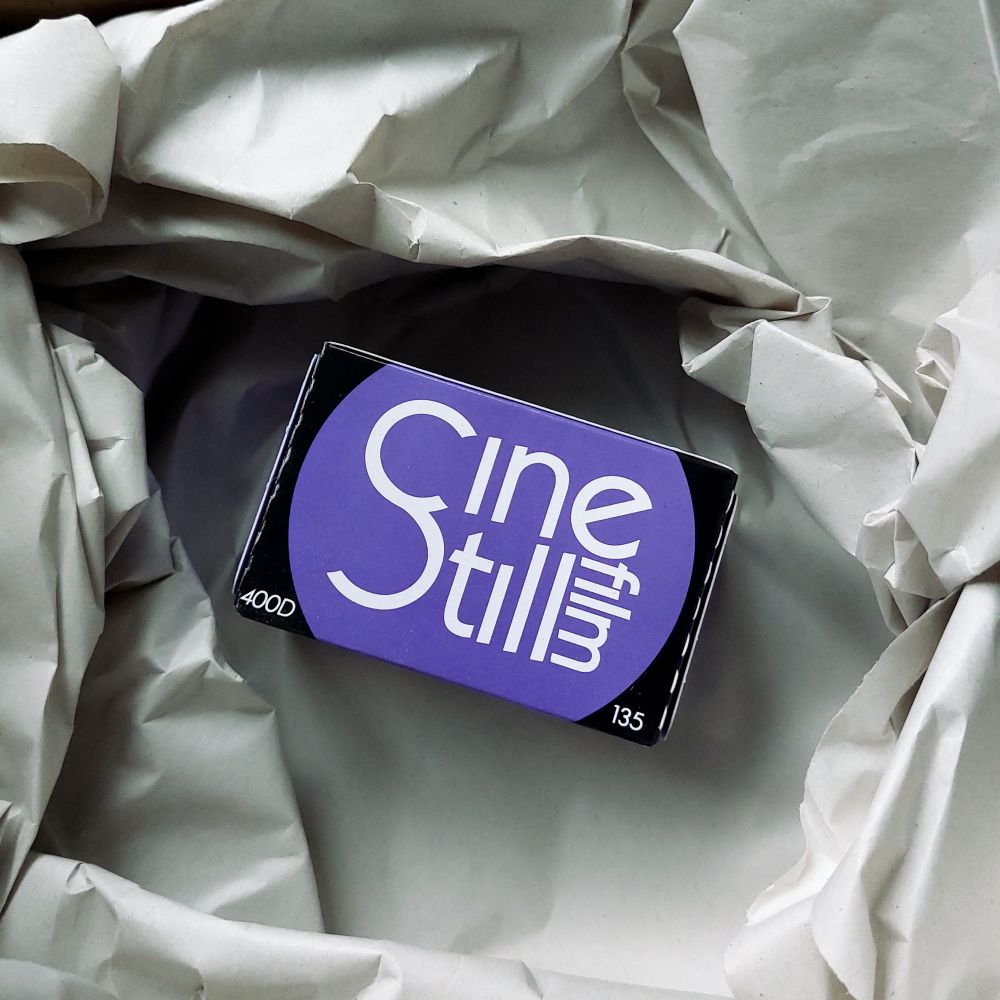 Photo of a box of CineStill 400D 35mm film 
