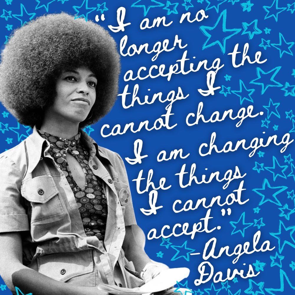 A black and white photo of Angela Davis against a blue background with lighter blue stars. White cursive text spells out “I am no longer accepting the things I cannot change. I am changing the things I cannot accept.” —Angela Davis. 