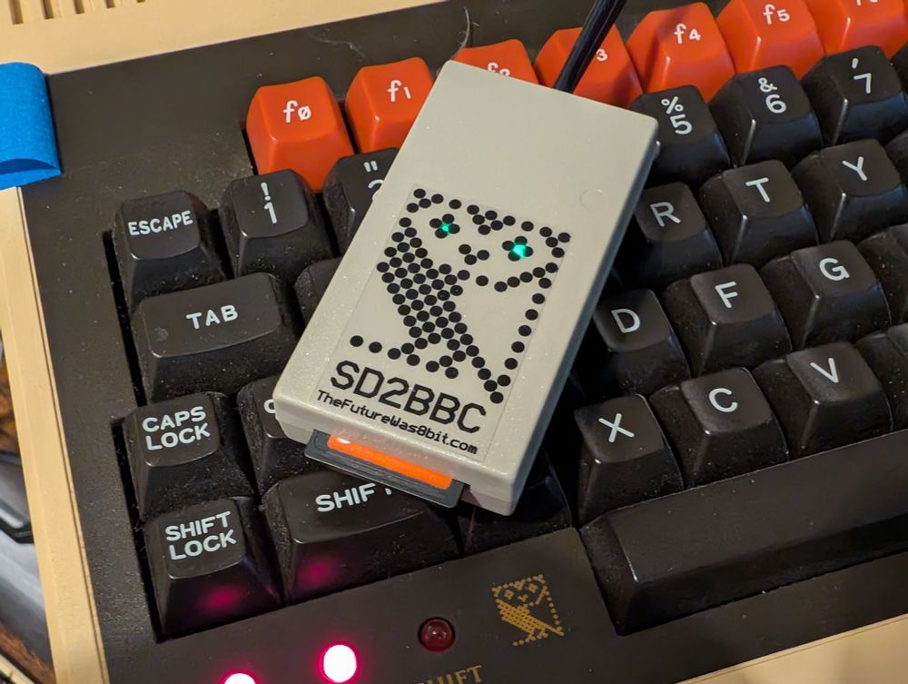 Acorn Computers BBC Micro (BBC Master Compact) with an SD2BBC. https://www.tfw8b.com/product/sd2bbc-bbc-micro-spi-sd-card-interface/
