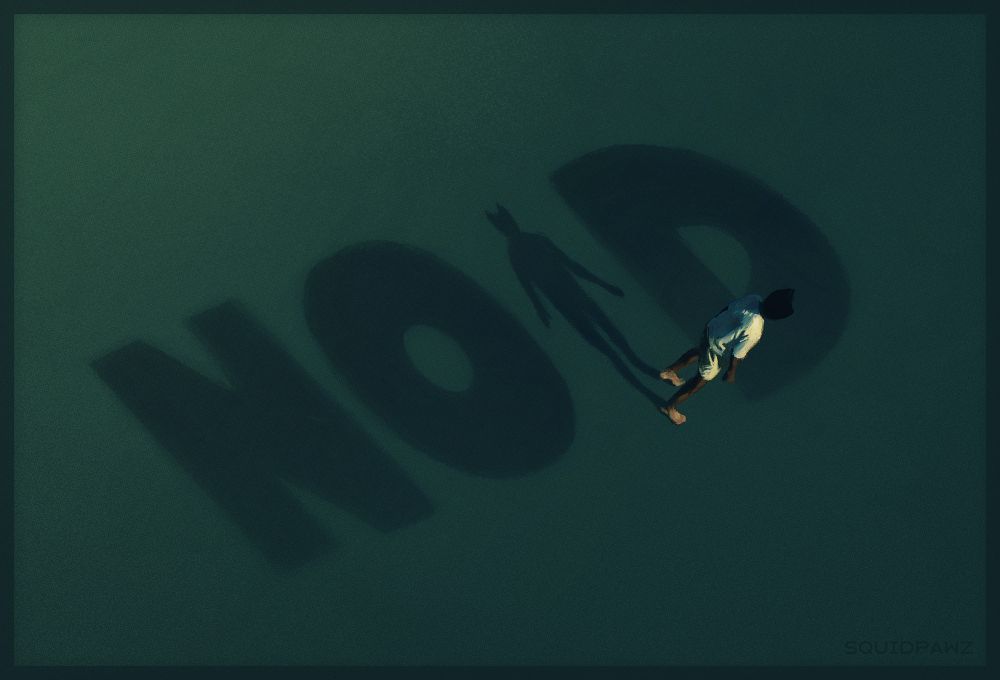 Digital art based on a scene from the music video for NOID by Tyler, The Creator. Tyler stands against a dark green background, viewed from high above. He's facing away from the viewer. His shadow stretches out behind him, forming the letter I in the word "NOID" spelled out on the ground.