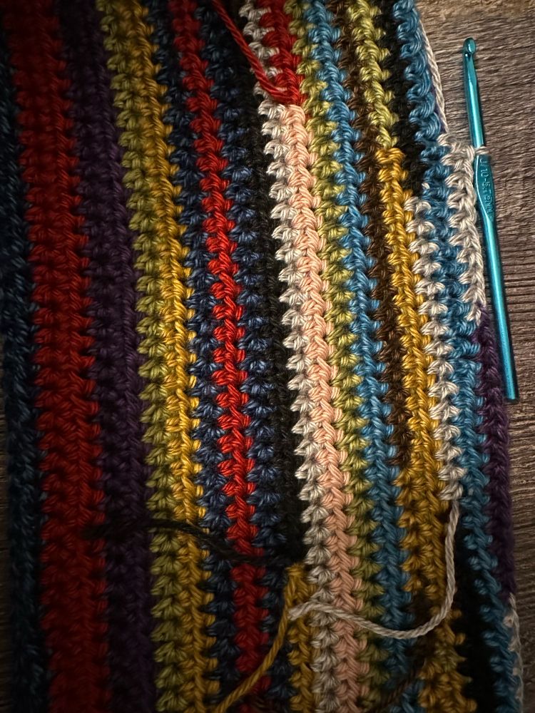 A row with purple and gray sections being added