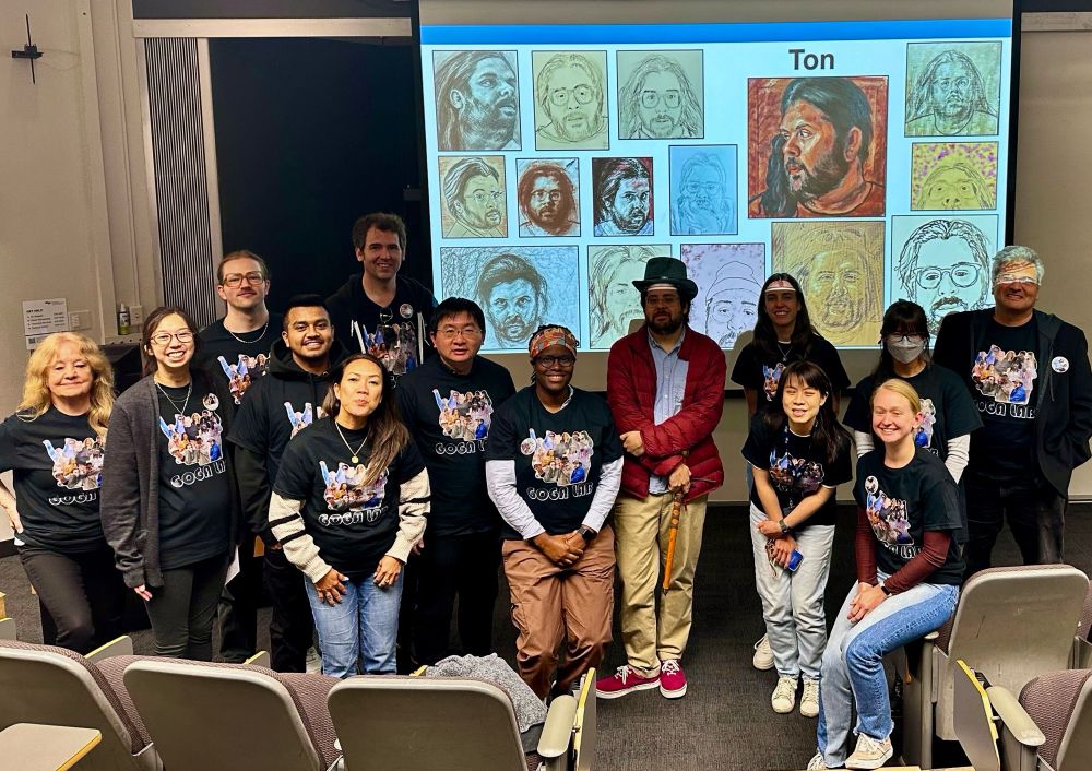 The GogaLab at UCSF posing in front of Ton Montoya self-portraits
