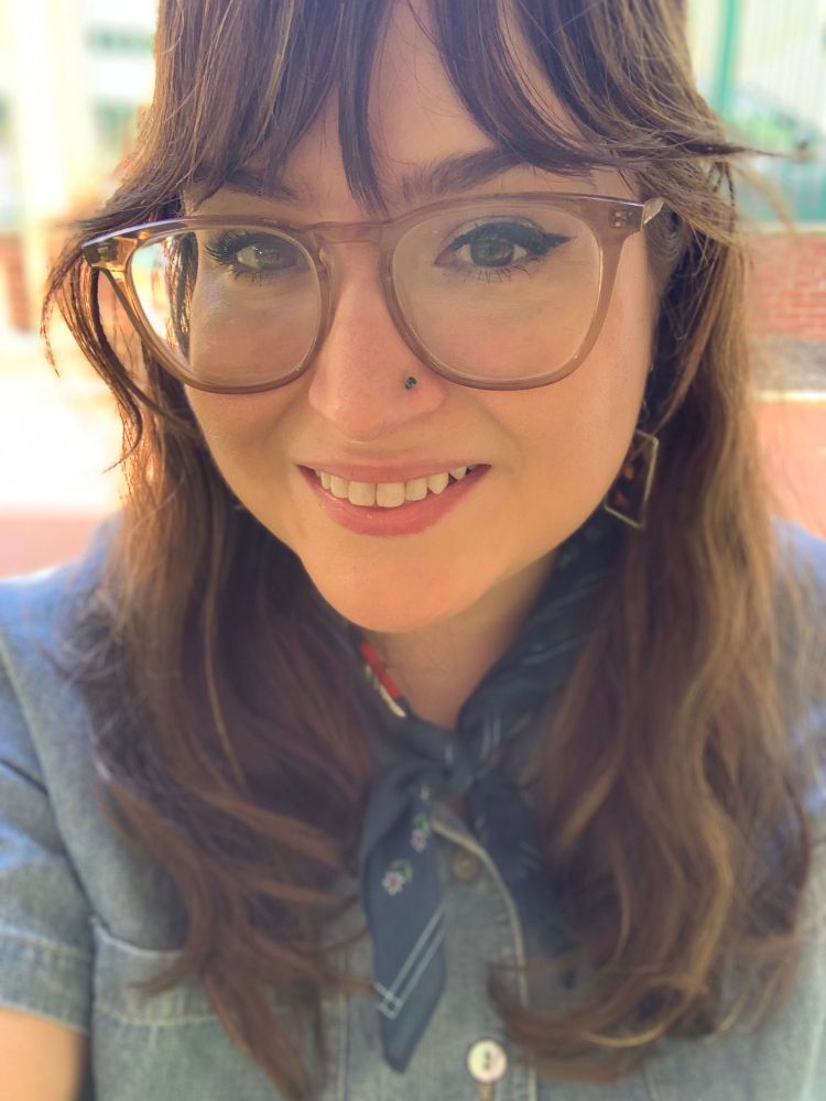 Photo of woman with glasses.