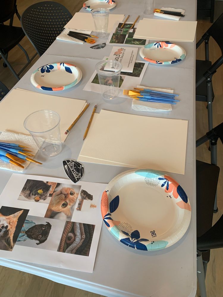 A table of art supplies. 
