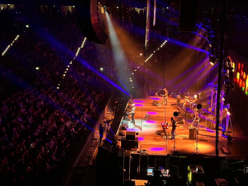 Sting performing on stage at the Barclays Arena in Hamburg