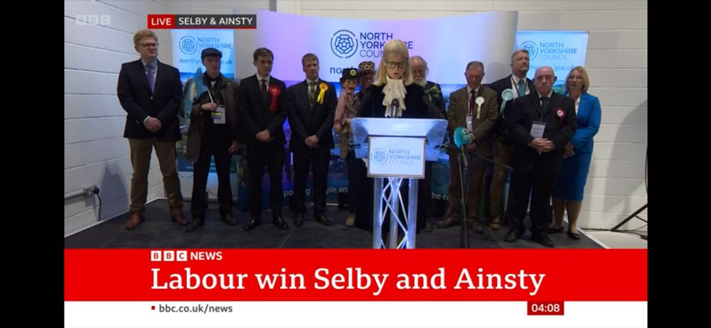 BBC News screengrab showing announcement of Labour win at Selby and Ainsty