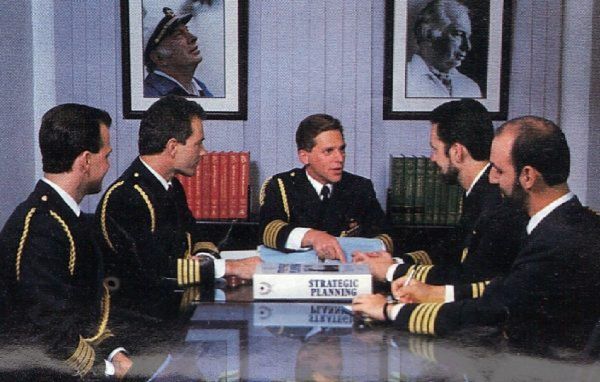 David "midget squirrel" Miscavige, with four officiers of scientology cult's paramilitary organization. All in uniform, with strategic documentation.