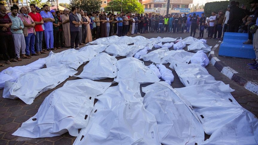 Shrouded corpses of 30+ murdered children in Gaza
