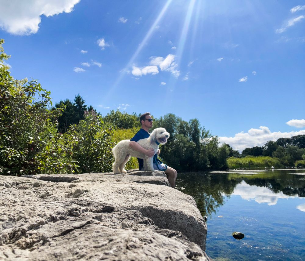 Me and Chester posing next to a lake