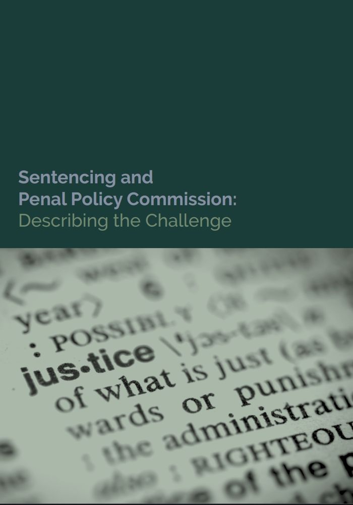 A picture of the front cover page of the primer paper, in a deep forest green background colour and a photo image of the dictionary definition of the word 'justice' and its meaning. The paper title says, 'Sentencing and Penal Policy Commission: Describing the Challenge.'