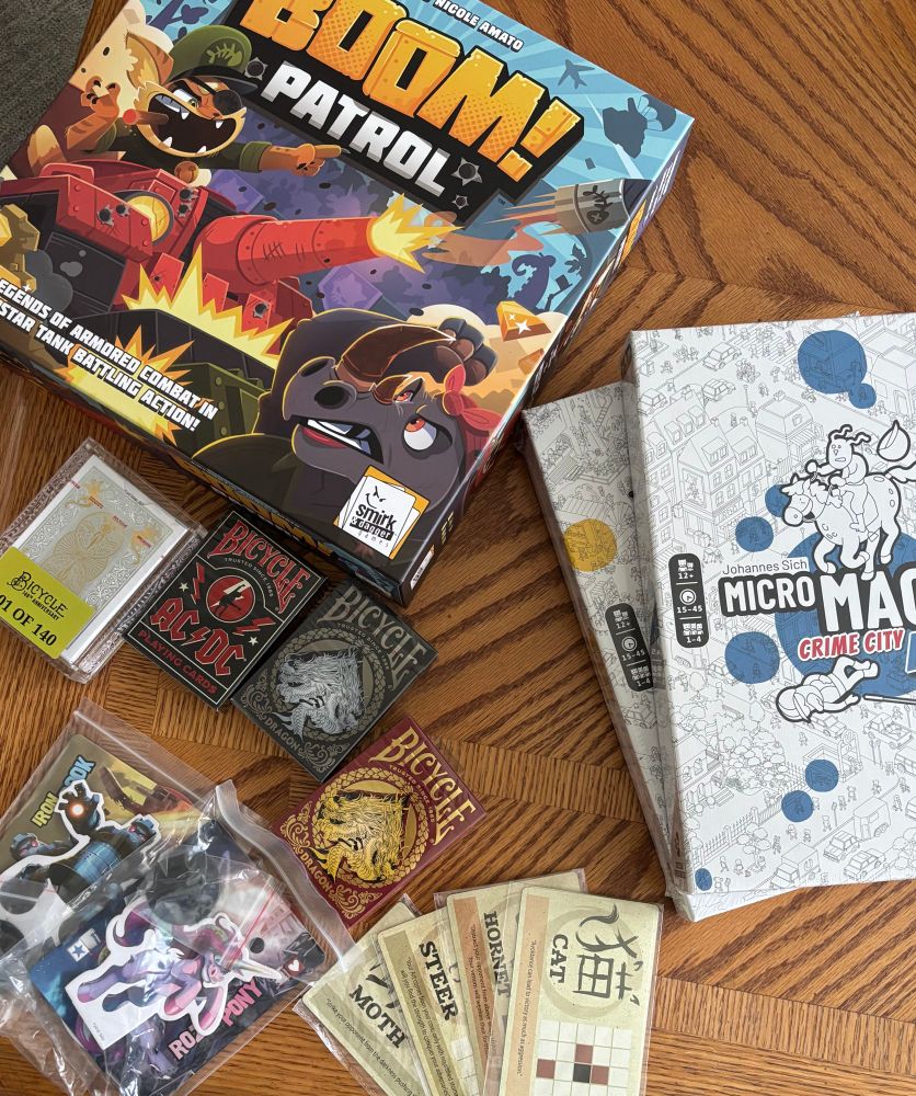 1 board game, 4 decks of cards, 2 puzzles, and 6 promo items. 