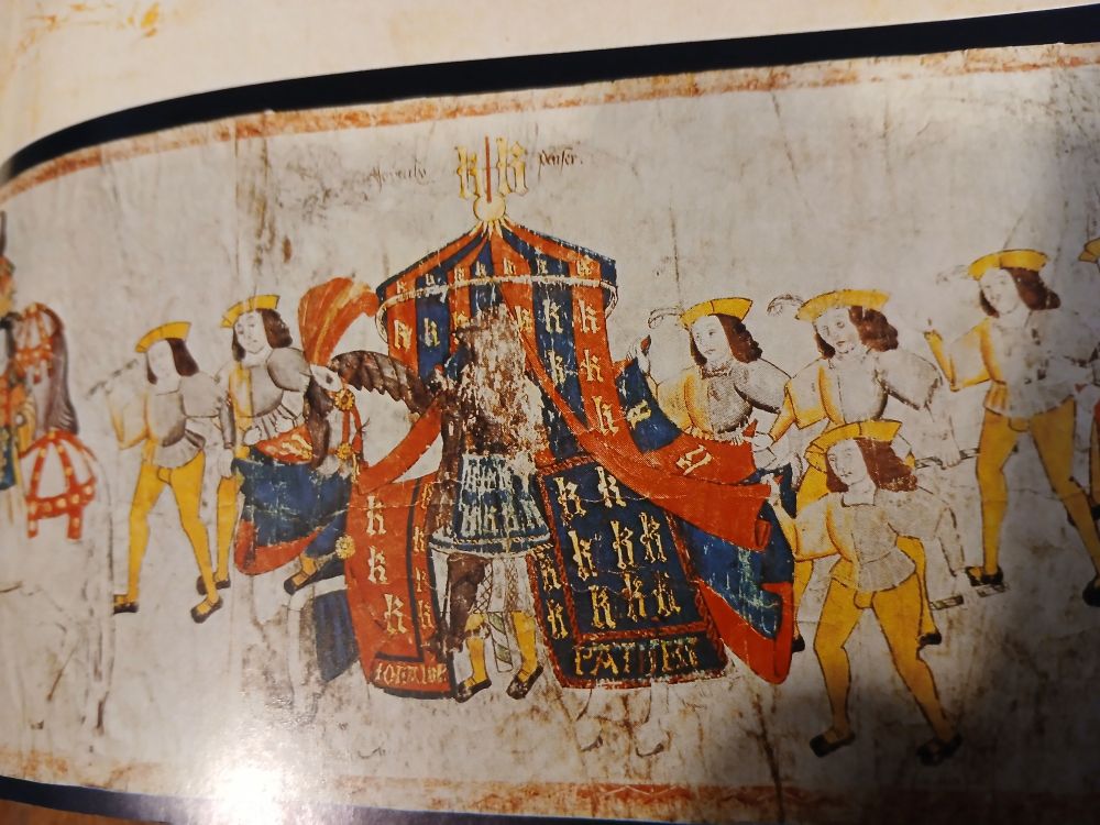 This horse mounted tent in red and blue is adorable, and might be my next tent.