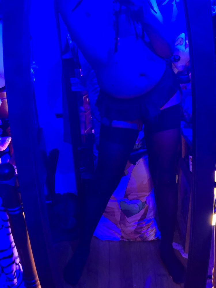 Me in a front shot in blue light 
I am wearing lingerie and thigh high socks