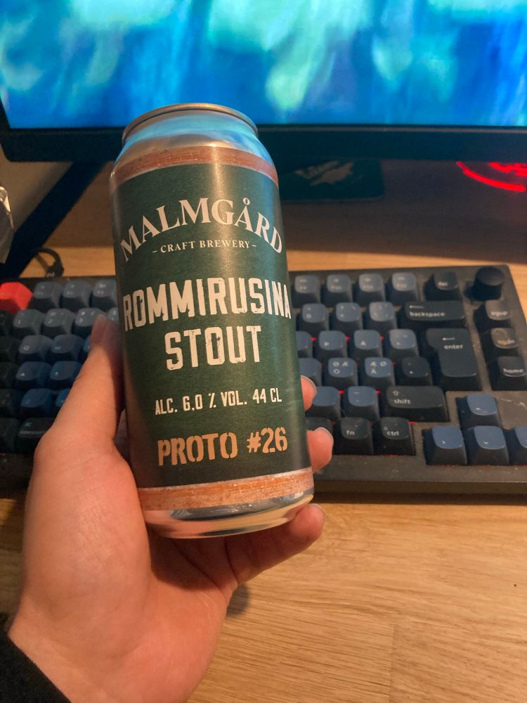 Beer can with text rum and raisins stout