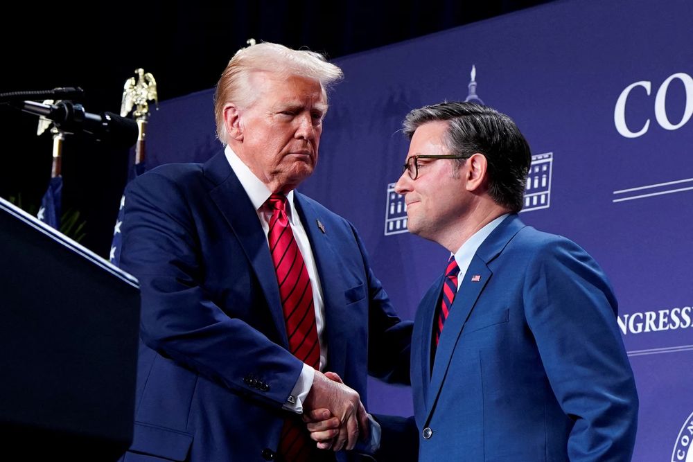 Mike “Reek” Johnson shaking hands with Donald Trump. 