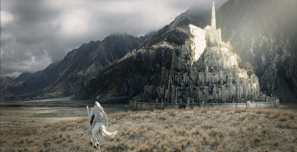 A screenshot from LORD OF THE RINGS showing Gandalf approaching Gondor.