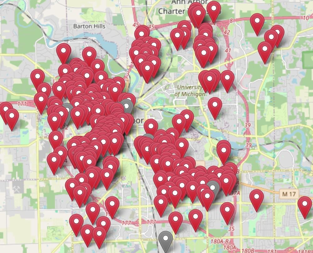 A map of Ann Arbor showing red pins marking locations of lawn codes. They are absolutely everywhere, you can hardly see the map for the codes!