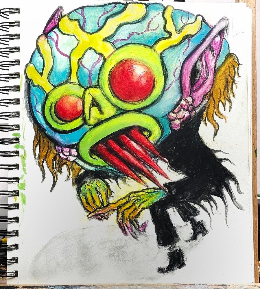 Watercolor crayon drawing of the Ghoul by Craig Gleason for his Season of the bad guys club art challenge. The art involves a blue monster with rainbow accents. He has pink veins that show through his skin and yellow ones that bulge out from the top of his eyes over his head. He has long red spikes for teeth, and pink boils under his cheekbones. The view is top down, and the proportions of the head are exaggerated, with the figure hitched over.