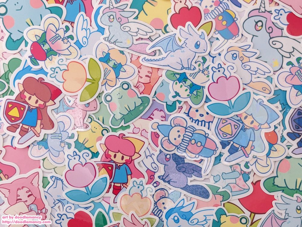 a huge mixed pile of my sticker designs