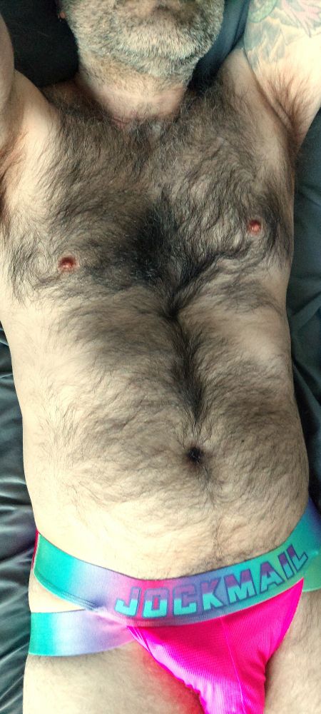 Hairy guy from chin to thighs, pits, hot pink Jockmail with iridescent bands