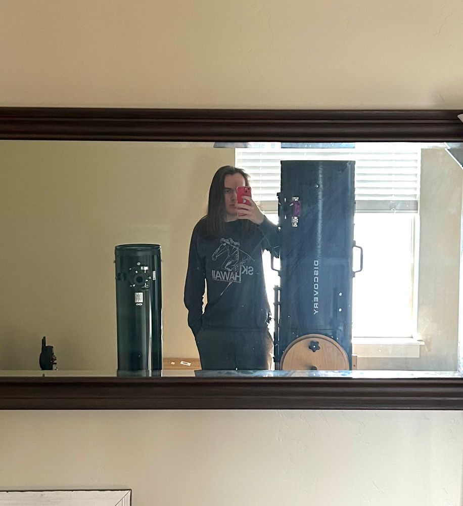 I stand between an XT8 telescope which reaches just below my shoulders, and my new 12.5” dob that extends 2 inches higher than me. The 12.5’s tube is as wide as me