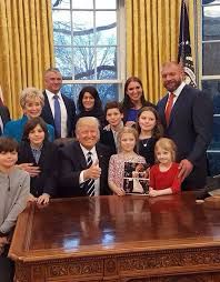 Triple H, Stephanie, Shane, and Linda McMahon stand by Donald Trump in a photo op with children, which is pretty disgusting considering the amount of cases against them for the trafficking and abuse of minors 