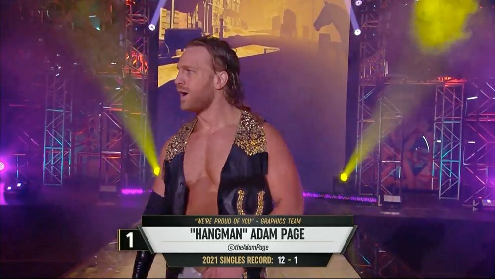 When Hangman Page went to fight Kenny Omega for the AEW World Championship at Full Gear, the graphics team put "We're Proud Of You - Graphics Team" Hangman Adam Page as his introduction. He would later go on to win the championship and we were all very very proud of him 