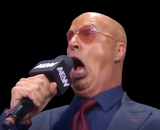A hot dog shaped human with a gross mouth opened unnecessarily wide vomiting words in a way that matches how we feel when listening to him. That hot dog shaped human is Don Callis