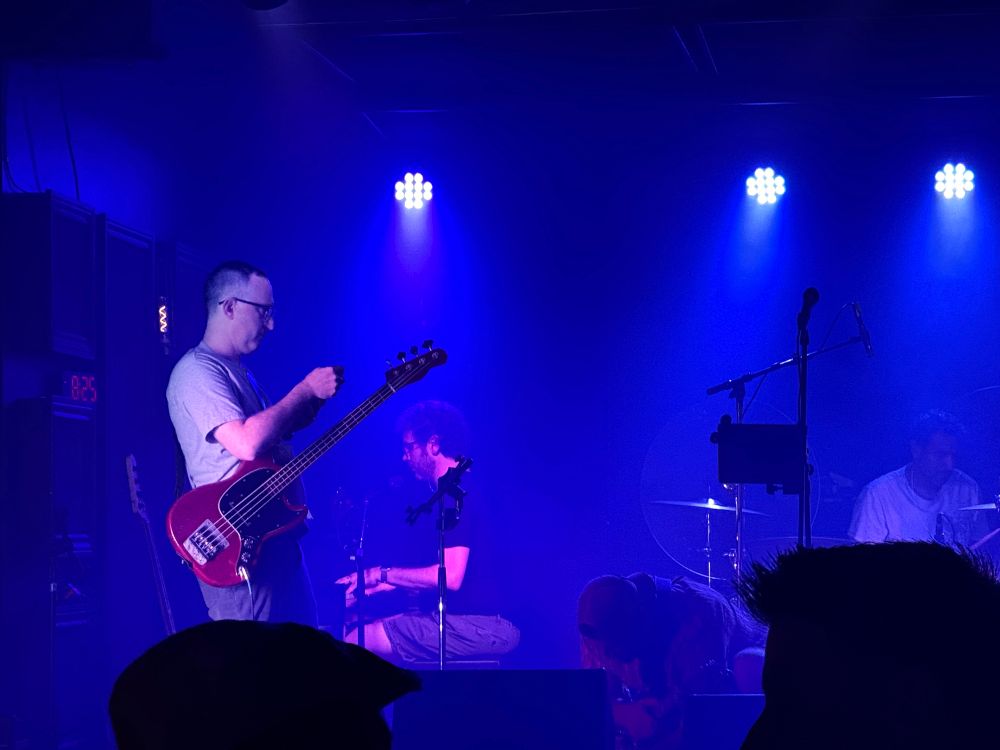 Obvs very talented pianist and pretty cool bassist and I guess some other guys setting up on stage at a tiny neighborhood brewery