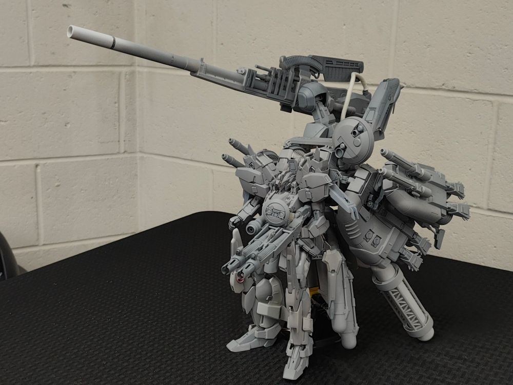 Massive Mecha kitbash that has been painted with grey primer.