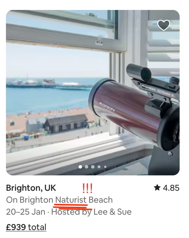 Telescope at a window overlooking a naturist beach