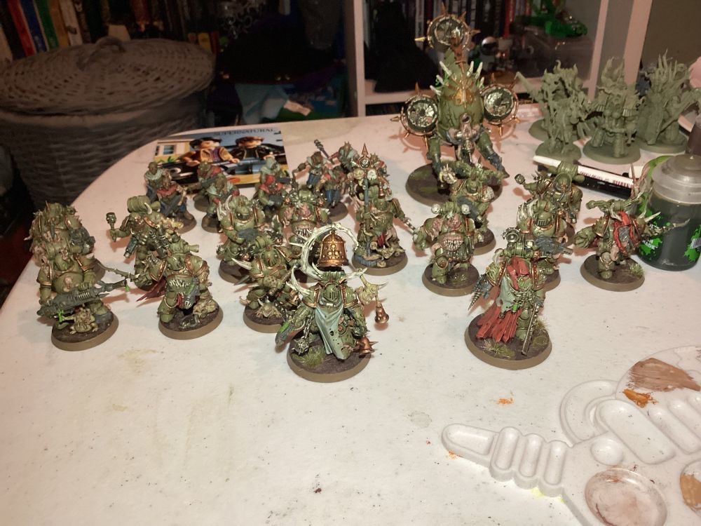 An army shot of 500 points of Death Guard - 12 Plague Marines, 10 Cultists, a Foetid Bloat-Drone, Noxious Blightbringer, Plague Surgeon, and Icon Bearer.