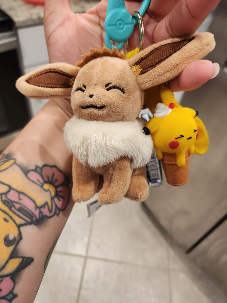 My keychain of eevee and pikachu as a snowcone