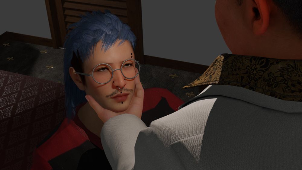 Picture showing Kai and Mabuchi. Mabuchi is holding Kai by his chin, Kai is looking up to him 