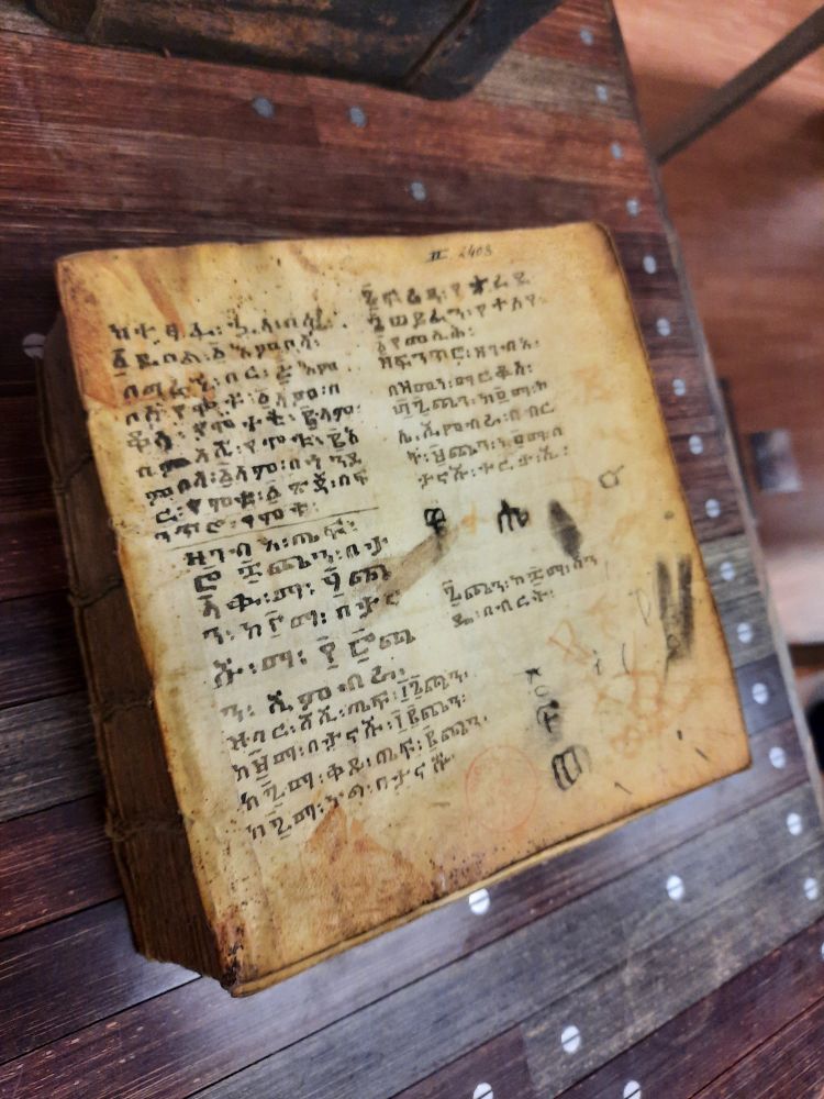 An Ethiopian codex, sewn with a kettle stitch, showing writing in Ge'ez.