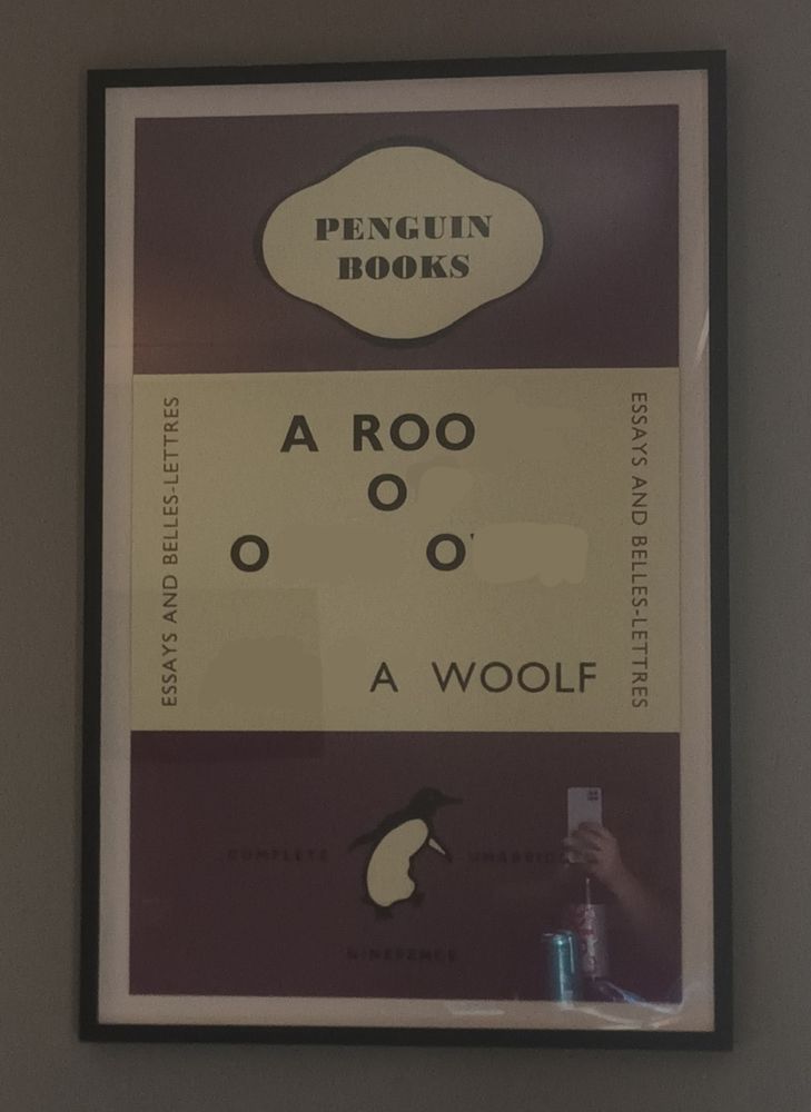 a poster of a penguin classic edition of 'a room of one's own' by virginia woolf but with letters erased so it only says 'arooooo' by a woolf

terrible digital edit, i didn't really deface hotel property don't worry