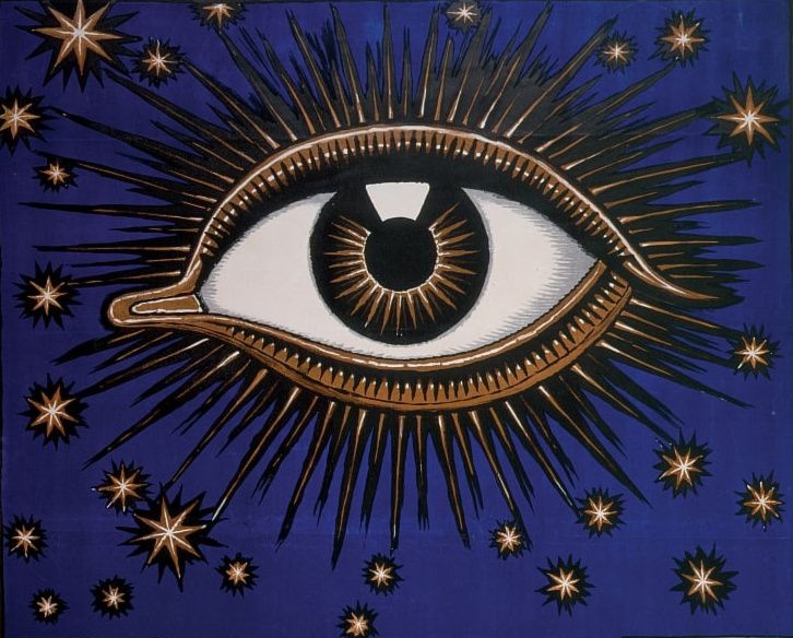A detail from a retro poster showing a large eye drawn in gold and black with a blue sky and gold stars behind it. The eye has points coming from all sides or it suggesting it is illuminated. 