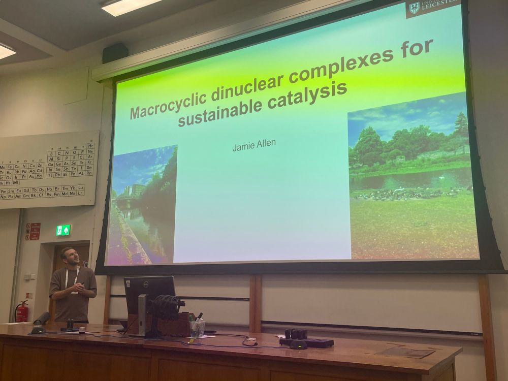 Researcher presenting using PowerPoint slides in a lecture theatre 