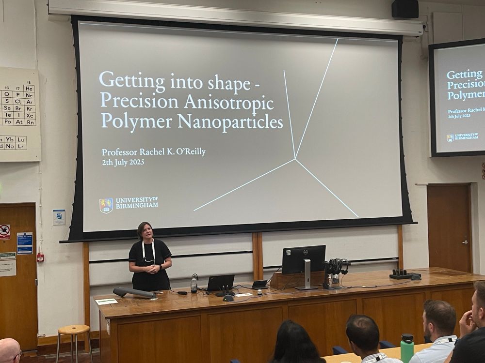 Researcher presenting using PowerPoint slides in a lecture theatre