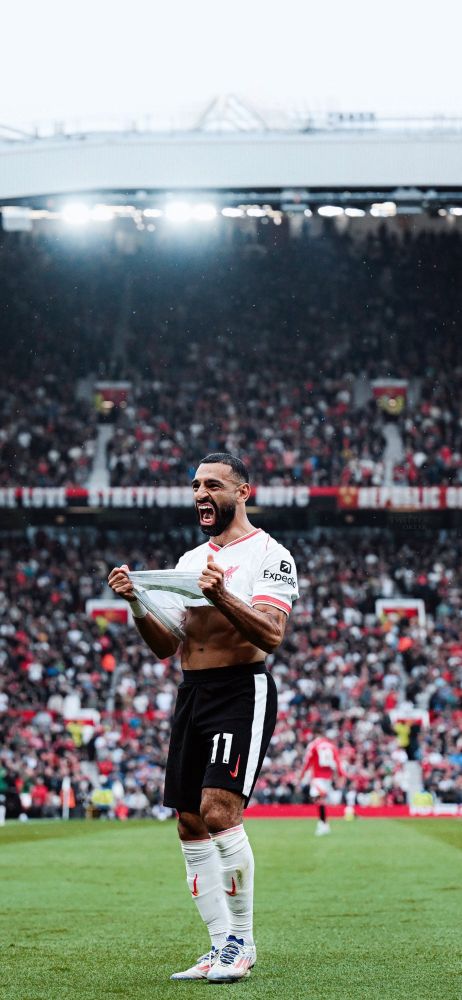 Mo Salah celebrating a goal against Manchester United