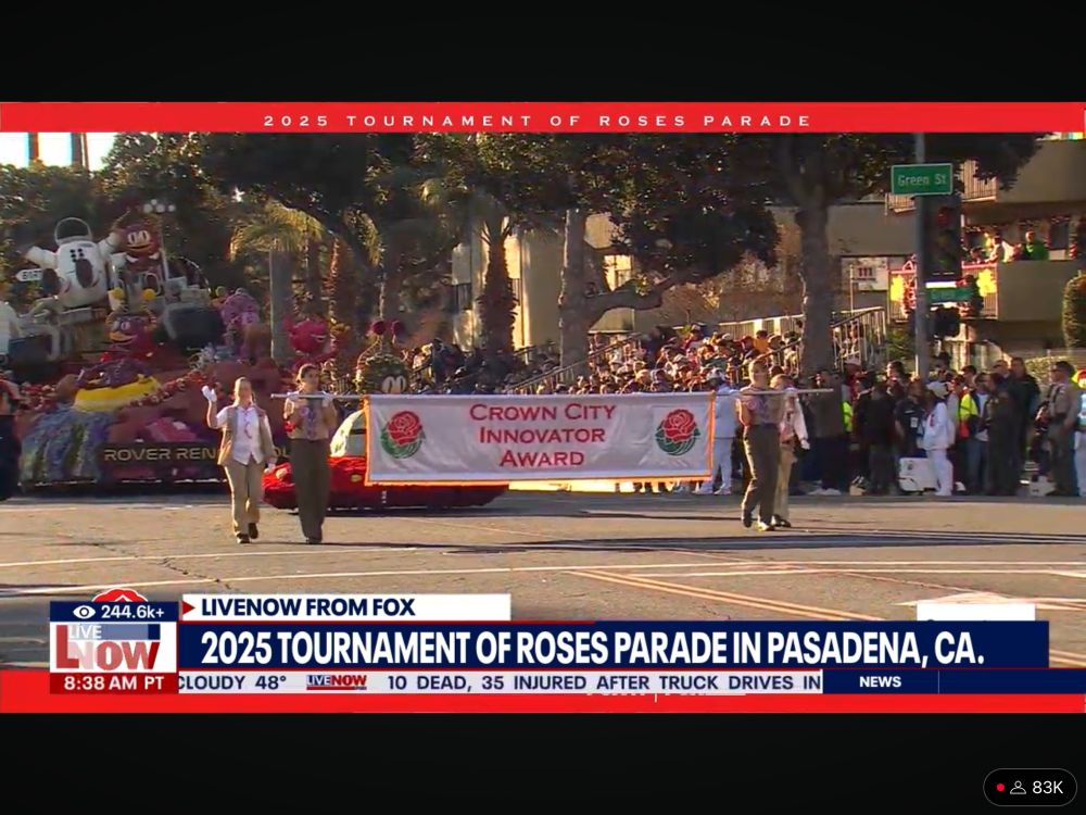 A screenshot from the livestream of the 2025 Tournament of Roses Parade. The image shows the La Cañada Flintridge float, the winner of the annual Innovation Award. The float depicts offensive whole scene on Mars, complete with astronauts, aliens, a large Mars Rover, and a flying drone decorated to look like the Ingenuity Mars helicopter.