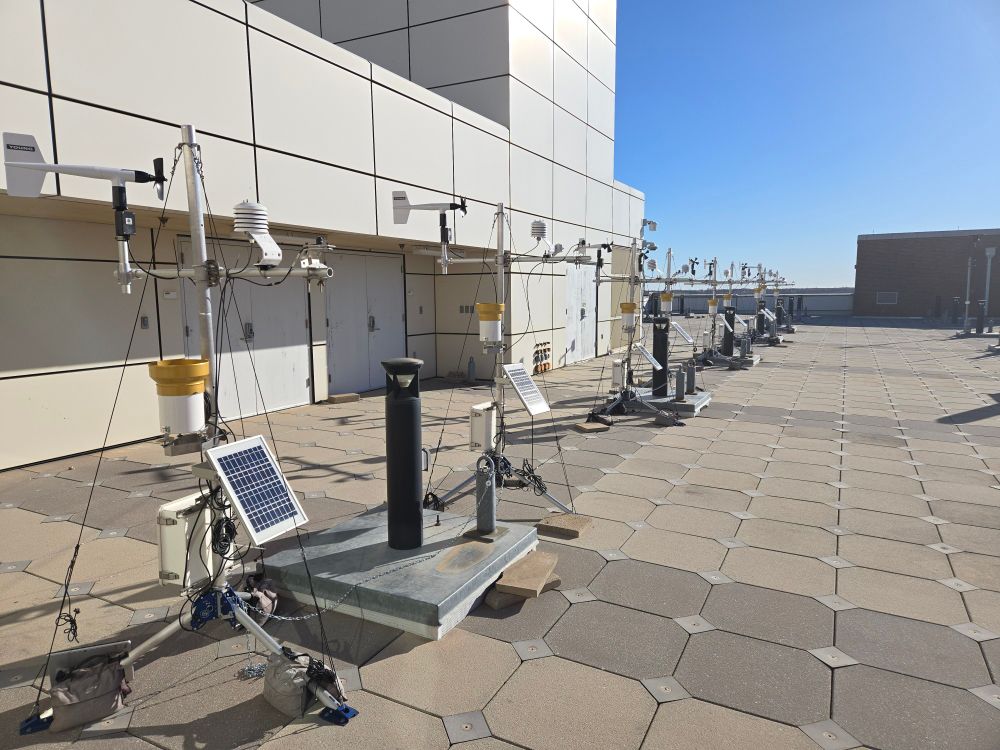 A series of weather stations on the roof of the National Weather Center.