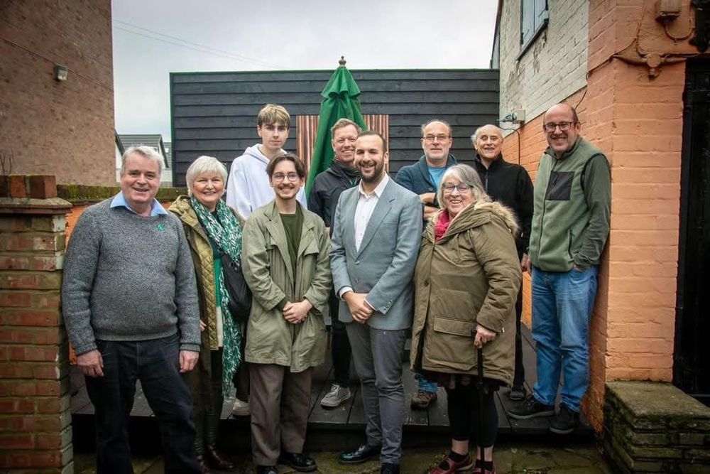 Group of members posing for a photo.