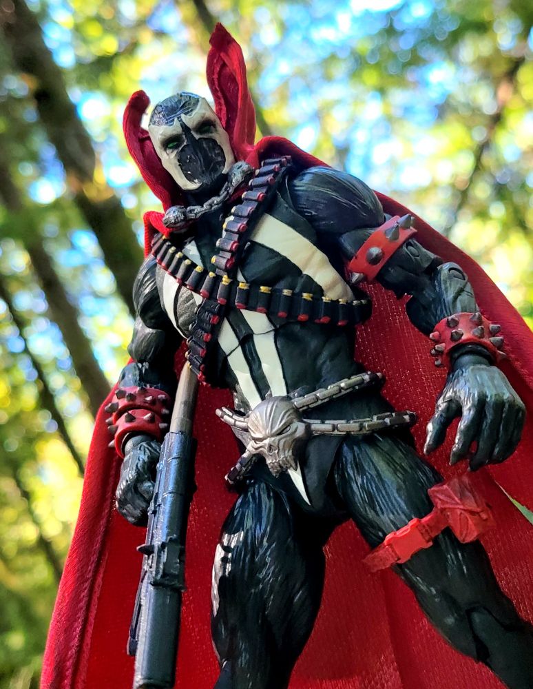 Spawn figure holding an assault rifle 