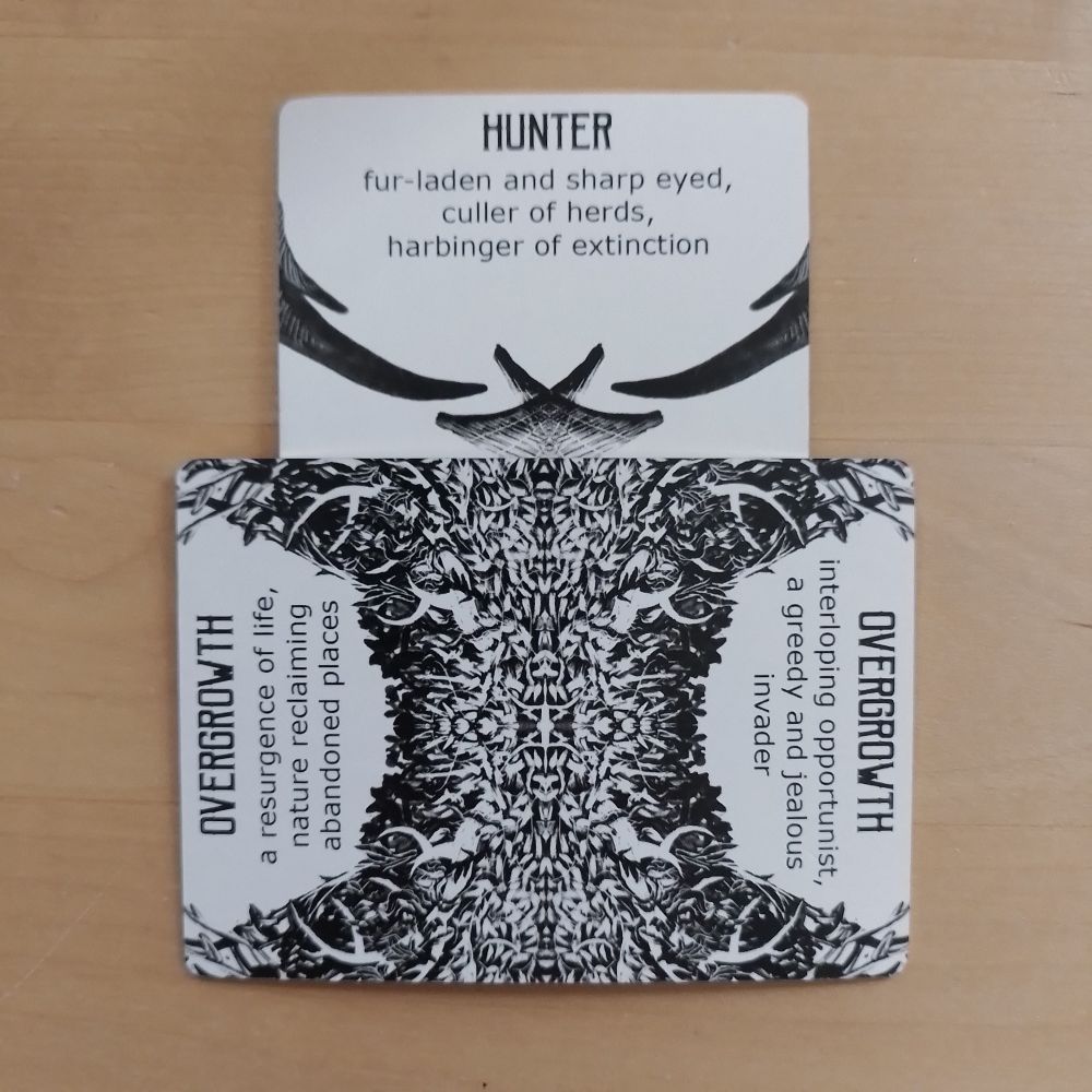 Two Spindlewheel cards: Hunter (fur-laden and sharp-eyed, culler of herds, harbinger of extinction) crossed with Overgrowth (a resurgence of life, nature reclaiming abandoned places/interloping opportunist, a greedy and jealous invader)