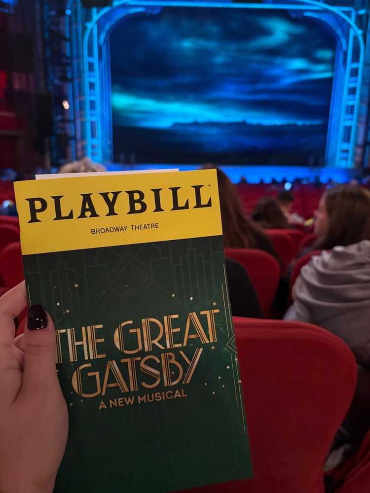 a view of the playbill of The Great Gatsby broadway show in front of the stage