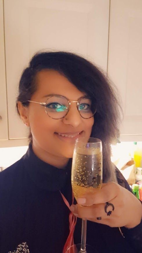 Me holding a glass up