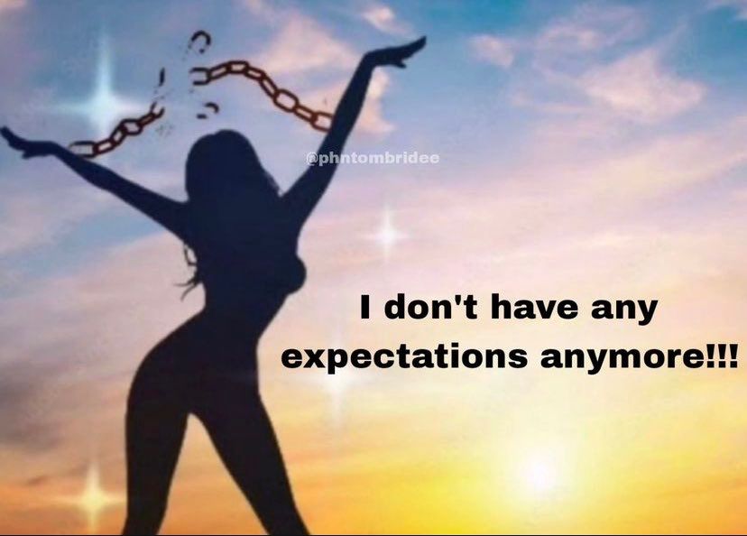 A woman’s silhouette breaking chains. It says “I don’t have any expectations anymore!”
