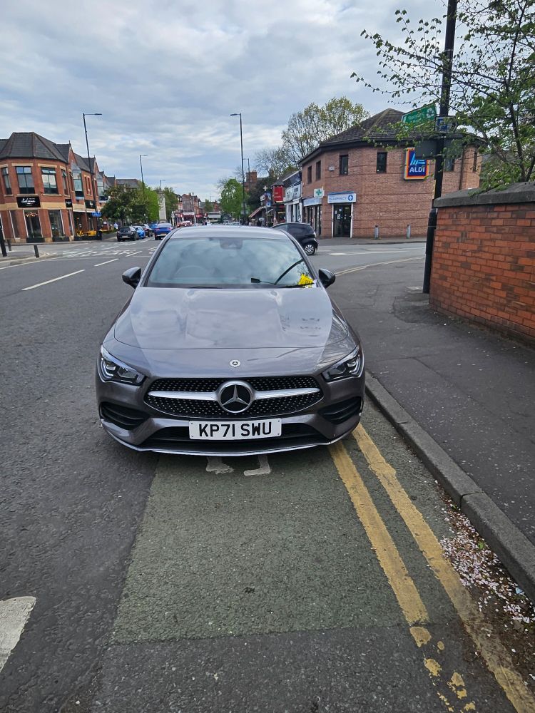 Car blocking cycle lane